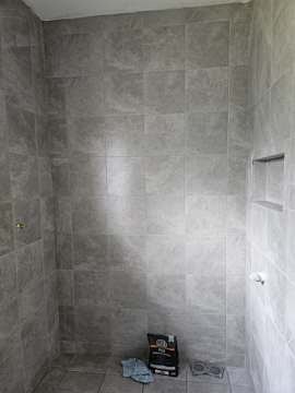 Finished tiled shower recess in a renovated bathroom